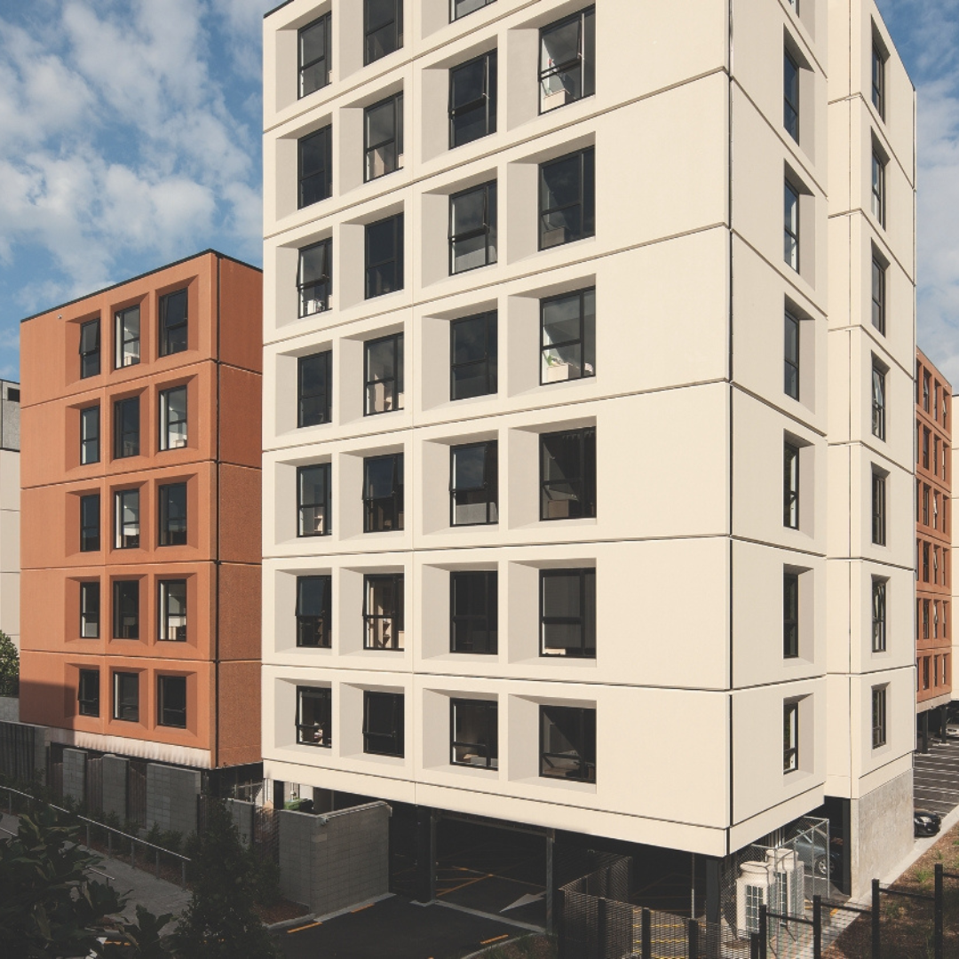 Exterior view of Carlaw Park Student Village in Auckland, a purpose-built student accommodation complex with four interconnected towers, protected by Passive Fire NZ fire-stopping solutions.