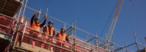 Passive Fire NZ certified crew standing on scaffolding at a construction site