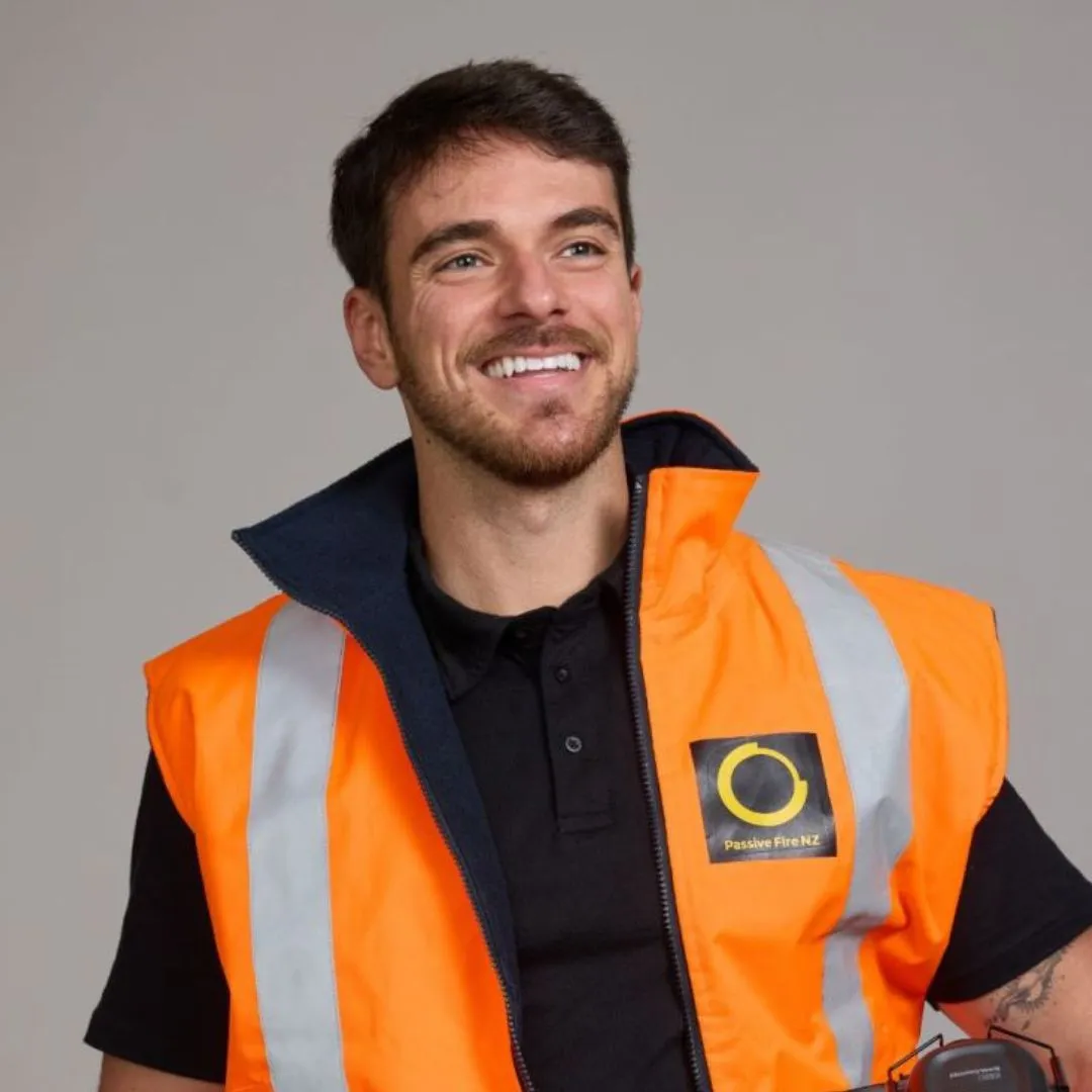 Lucas Santos, new Commercial Manager at Passive Fire NZ, wearing hi-vis vest.