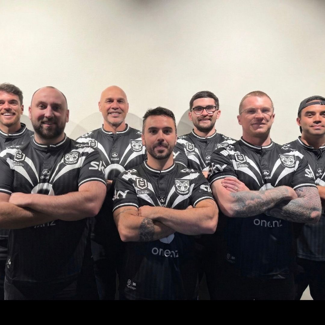 Passive Fire NZ team members wearing One NZ Warriors jerseys in support of the NRL season opener