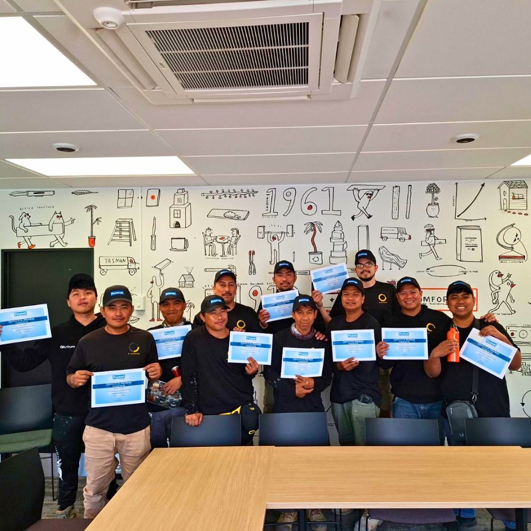 Passive Fire NZ team holding Promat training certificates after firestopping training session